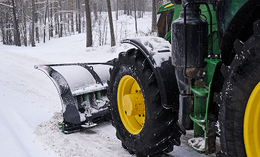 big-special-tractor-is-removing-snow-from-forestal-road 2